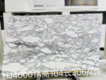 Arabescato White marble slab with a dense grey vein network