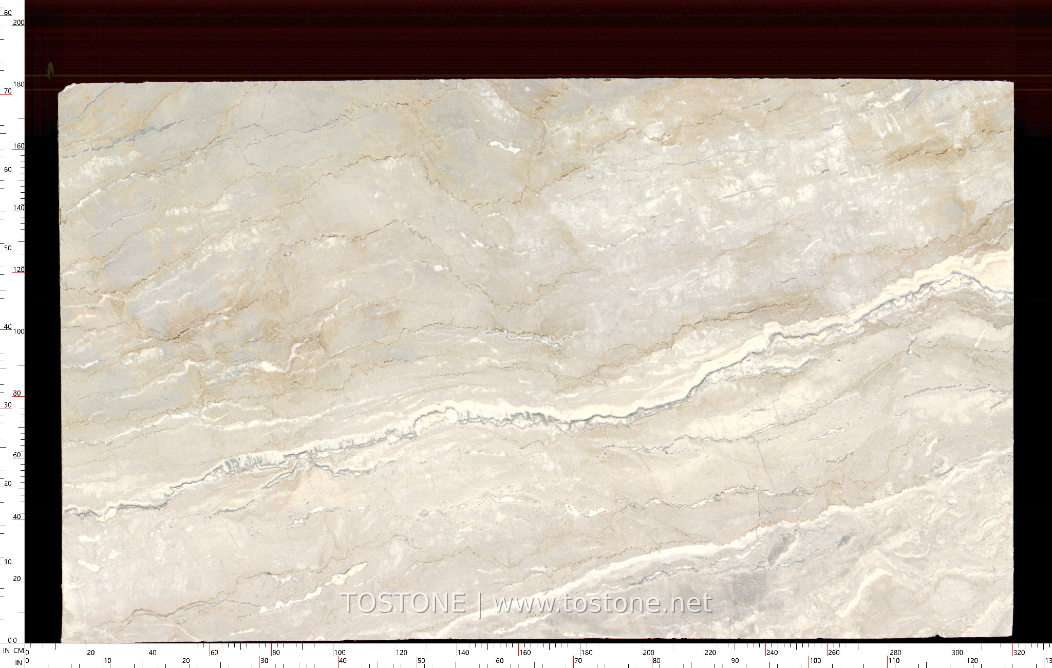 Aus Dream Marble Slab Front Aus Dream Marble slab from Australia with an ivory background and sweeping white and grey veins