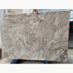 Blossom Marble slab with large ivory and soft grey shapes outlined by warm taupe and blush lines