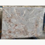 Blossom Marble slab with large pale grey shapes, white accents and fine blush-pink and taupe lines