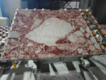 Blush Petals marble slab with a large cream area surrounded by pink patterning