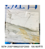Calacatta Borghini marble slab with a white upper field and bold grey and gold veining across the lower half