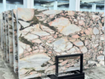 Vietnamese Calacatta Rosa marble slabs with pale pink and cream areas framed by dark veins