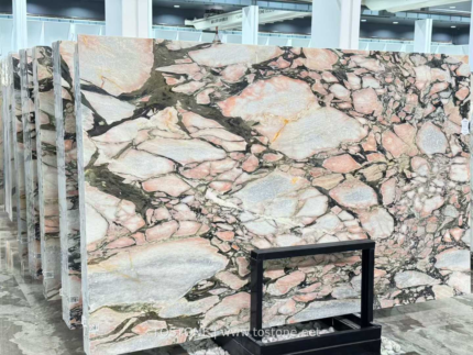 Vietnamese Calacatta Rosa marble slabs with pale pink and cream areas framed by dark veins