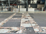 Workshop layout of Calacatta Rosa marble pieces showing pattern alignment