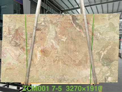 Italian Ceppo marble slab with blush pink and warm beige areas surrounded by sage green and pale ivory veins