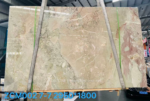 Ceppo marble slab with a broad warm beige field, pale veins and rose and sage green areas along the sides