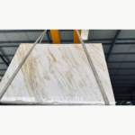 China Calacatta Gold stone slab with a white background and gold, taupe and gray veining