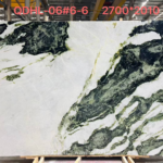 China Snow Green Marble slab with a white background and sweeping dark green mineral patterns