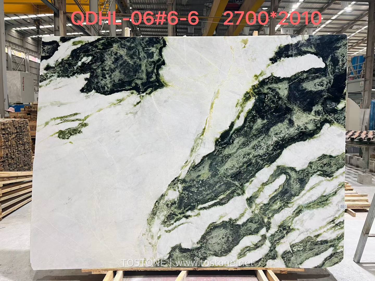 China Snow Green Marble Slab – Front View China Snow Green Marble slab with a white background and sweeping dark green mineral patterns