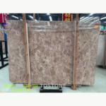 Crystal Light Brown Marble slab with taupe-brown tones and cream veining, with original labels and protective wrapping