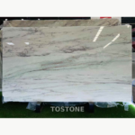 Desert Oasis Marble slab with soft pale green shading and fine grey horizontal veins