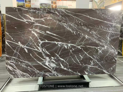 Espresso Vein marble slab with deep brown background and sweeping white veins
