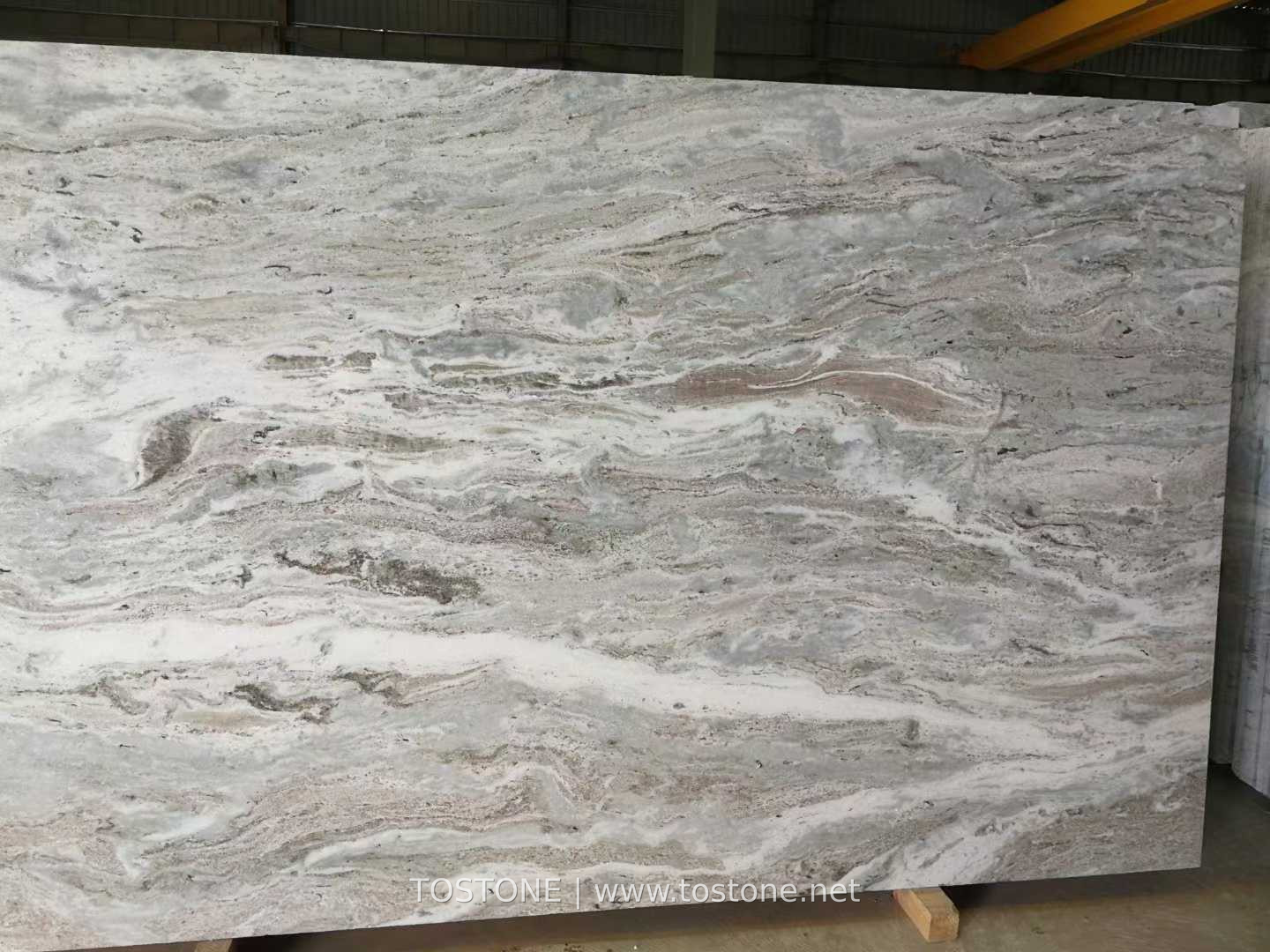 fantasy-brown-marble-slab-01-tostone Front view of Fantasy Brown marble slab with flowing cream, grey and brown bands