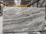 Fantasy Brown marble slab displayed in a workshop