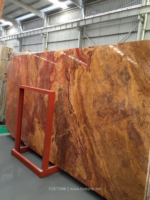 Golden Travertine Slab with sweeping rust-red and ochre veining