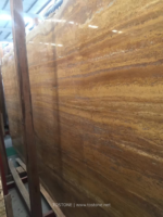 Close angled view of Golden Travertine Slab showing gold and brown layers