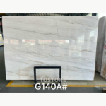 Guangxi White Marble slab with fine gray and beige linear veining, marked G140A
