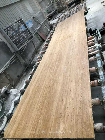 Iran Beige Travertine slab on a workshop production line