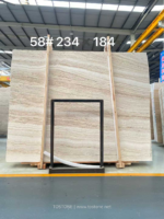 Iran Super White Travertine slab with warm beige flowing bands