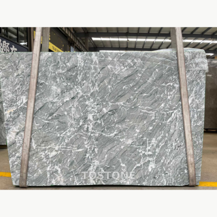 Iranian Green Marble slab with broad sage-grey areas, diagonal charcoal lines and crossing white veins