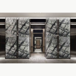 Elevator-lobby design reference featuring Italian Silver Fir Marble patterned wall panels
