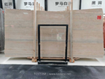 Italian Silver Travertine vein-cut slab bundle with soft grey lines