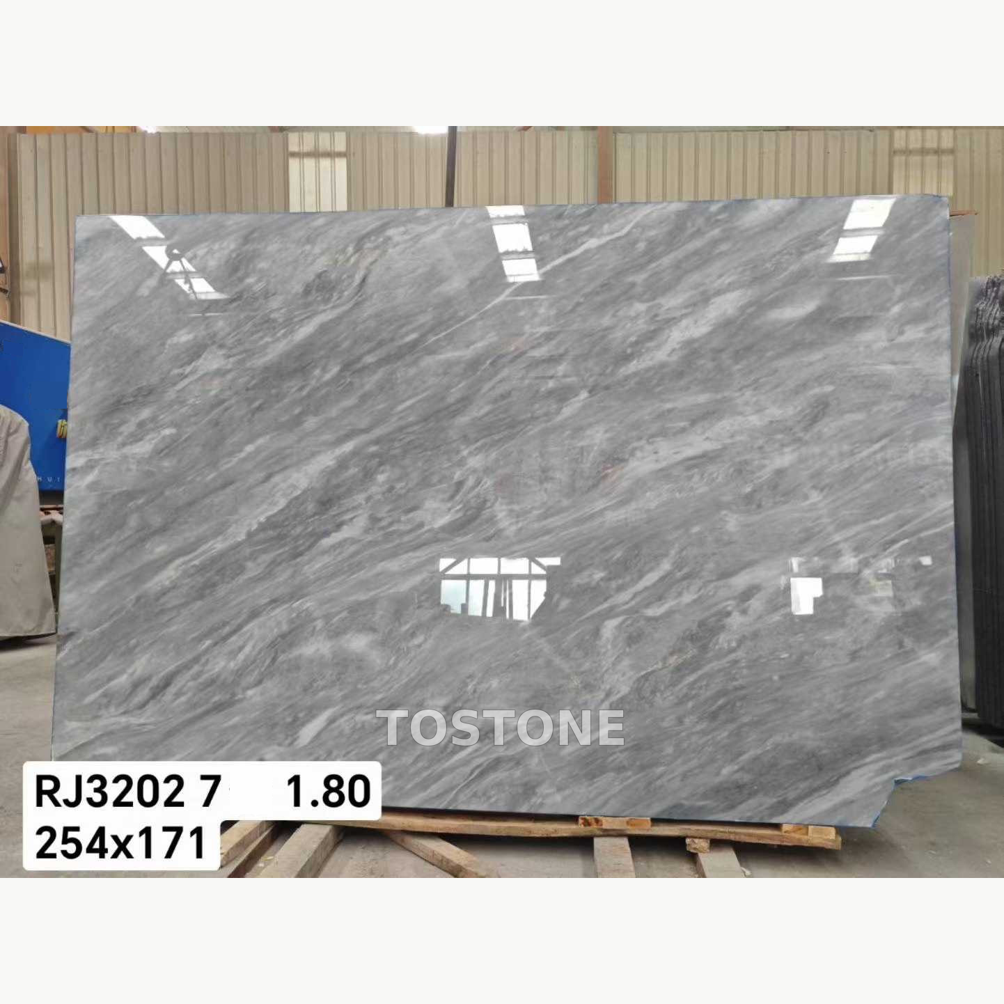 italian-space-grey-marble-01-tostone-watermark-partial-clean-square Italian Space Grey Marble slab with diagonal silver-grey and white streaks, retaining the inventory overlay.