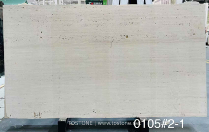 Front view of Ivory Travertine slab with subtle beige banding