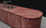 Design reference showing a curved red marble counter with white veins and an inset sink