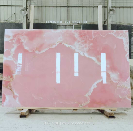 Pink Onyx Marble Slab showing pink centre and irregular creamy-white borders