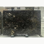 Platinum Diamond stone slab with charcoal swirls, silver-grey streaks and cream patches on the left