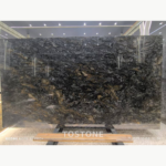Platinum Diamond slab with silver-grey waves, charcoal areas and warm cream and bronze patches