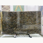Platinum Diamond slab with flowing charcoal, silver-grey and bronze-toned patterns