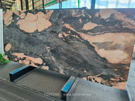 Portuguese Calacatta Rosa marble slab with broad charcoal movement and pink areas