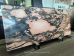 Portuguese Calacatta Rosa marble slab with large peach-pink areas and dark grey movement