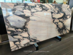Portuguese Calacatta Rosa marble slab with broad cream areas framed by dark veins