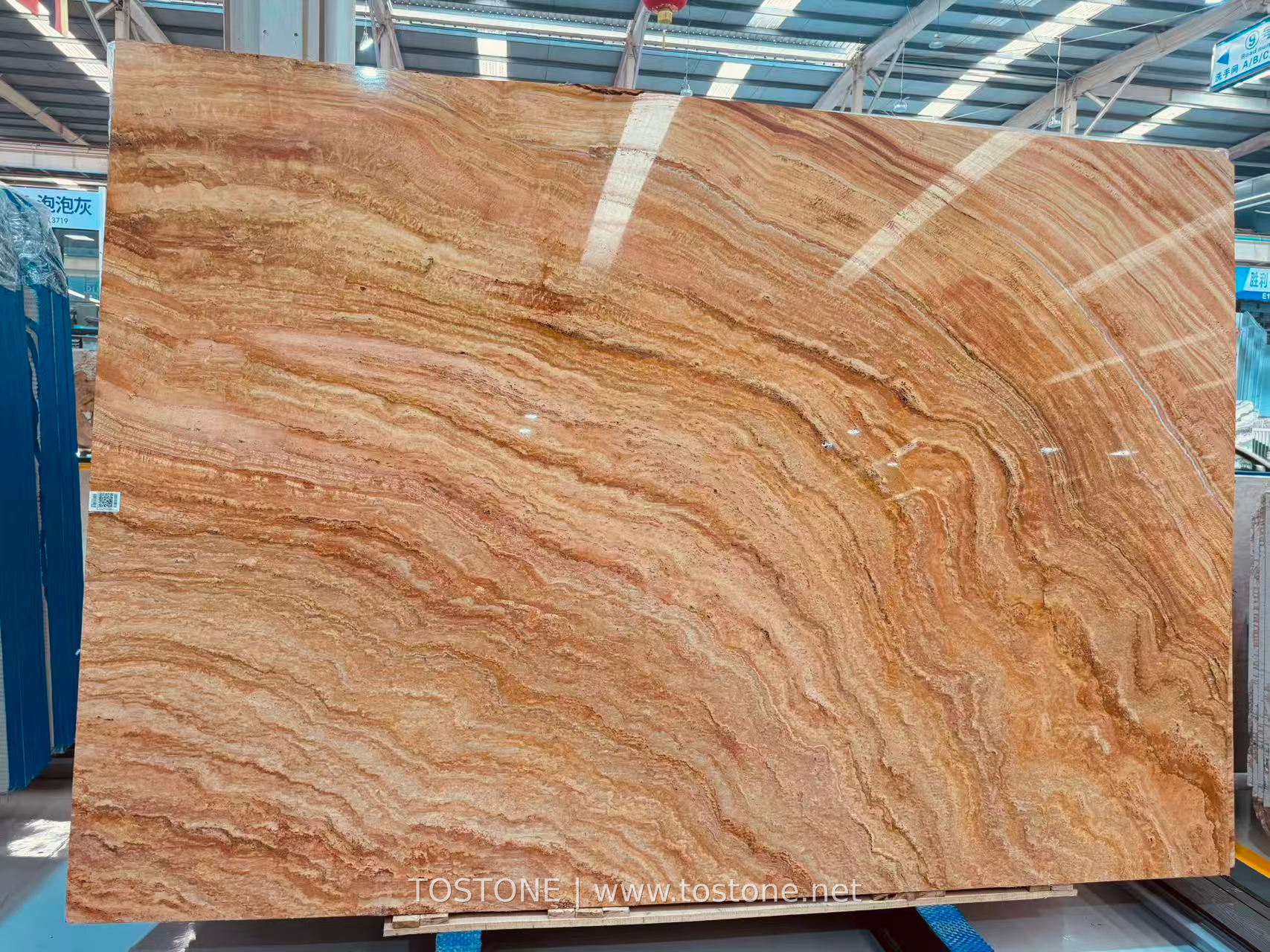 rainbow-travertine-slab-01-tostone-watermark Rainbow Travertine Slab with sweeping peach, cream and gold bands