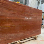 Angled Red Travertine slab with terracotta and cream bands