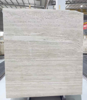 Upright Italian Roma Travertine slab with pale cream horizontal layers
