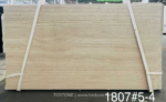 Roma Travertine vein-cut slab bundle with subtle beige banding
