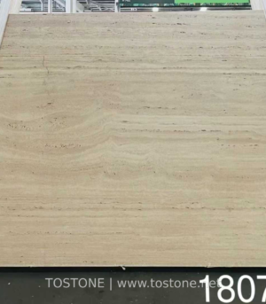 Roma Travertine vein-cut slab bundle with subtle beige banding