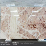 Rosa Picasso marble slab with pale pink areas and broad branching cream-white veins
