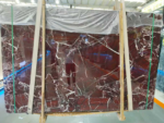 Rosso Levanto marble slab with broad wine-red areas and white veining