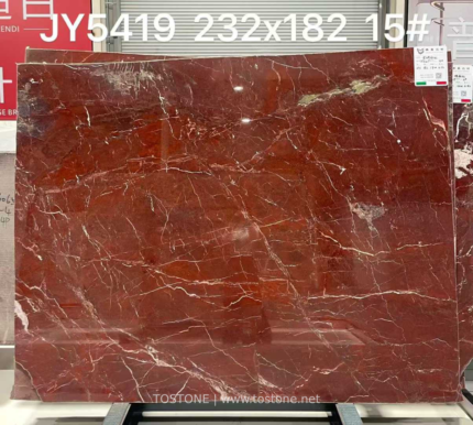 Rouge du Roi marble slab with deep red-brown tones and fine pale veins