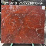 Rouge du Roi marble slab with warm red areas and contrasting pale lines