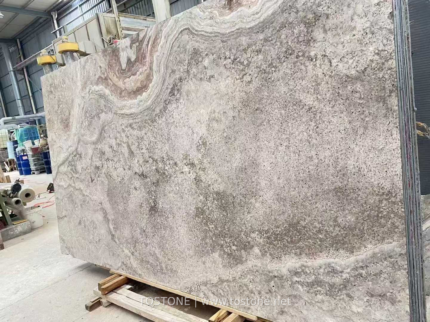 Angled Iranian cross-cut Silver Travertine slab with cloud-like grey and taupe pattern