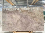 Front view of Iranian cross-cut Silver Travertine with broad mottled movement