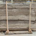 Iranian vein-cut Silver Travertine slab with wavy horizontal grey and cream bands