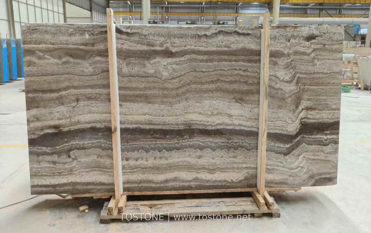 silver-travertine-slab-vein-cut-01-tostone Iranian vein-cut Silver Travertine slab with wavy horizontal grey and cream bands